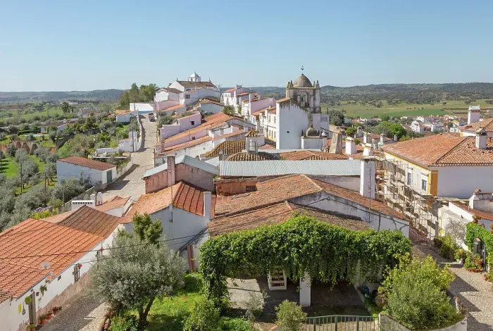 Framed Print : View over rooftops of whitewashed houses and streets in the small rural settlement village of Terena, Alentejo Central, Portugal, Europe Framed Print : View over rooftops of whitewashed houses and streets in the small rural settlement village of Terena, Alentejo Central, Portugal, Europe