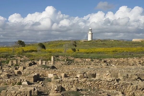 View over ruined Roman town to the lighthouse, The Agora, Archaeological Park, Paphos, UNESCO World Heritage Site, Cyprus, Europe
