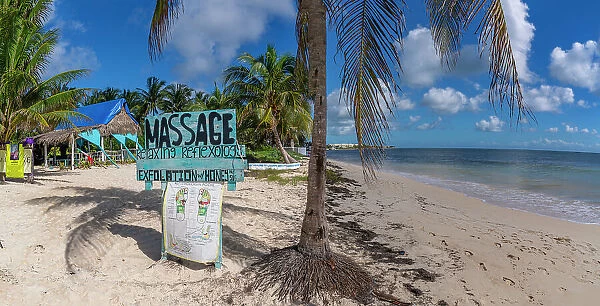 View of rustic massage sign on beach near Puerto Morelos, Caribbean Coast, Yucatan Peninsula, Mexico, North America