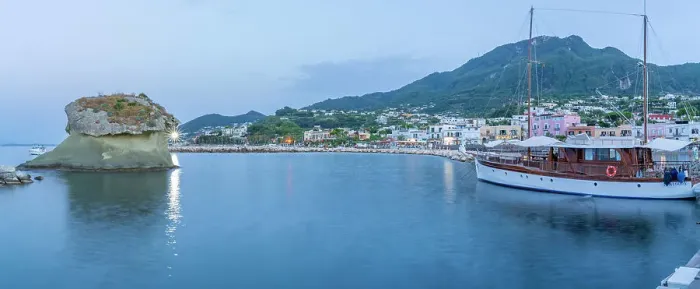 Framed Print : View of sailboat and town of Lacco Ameno at dusk, Island of Ischia, Campania, Italy, Europe Framed Print : View of sailboat and town of Lacco Ameno at dusk, Island of Ischia, Campania, Italy, Europe