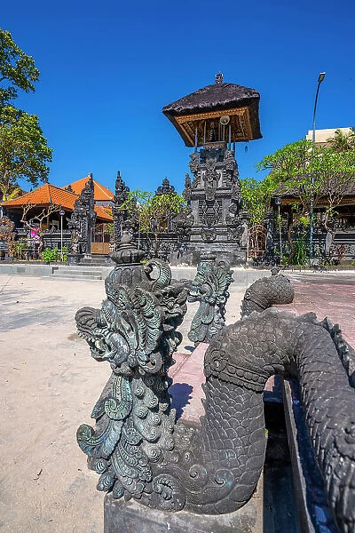 View of sculpture and Hindu Temple near Shelter Kebencanaan on Kuta Beach, Kuta, Bali, Indonesia, South East Asia, Asia