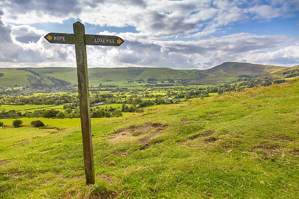 View of signpost and Hope Valley, Derbyshire Peak District, Derbyshire, England
