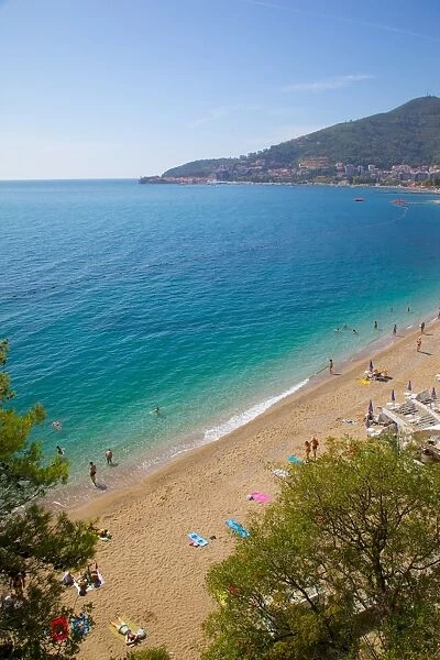 View of Slovenka Plaza Beach and Budva, Budva, Montenegro, Europe