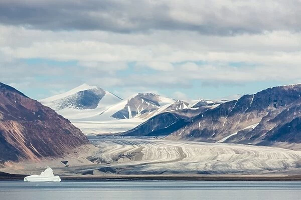 View of snow-capped mountains from Cape Hay, Bylot Island, Nunavut, Canada, North America