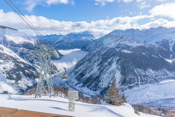 Framed Print : View of snow covered Aosta Valley, mountains and Skyway Monte Bianco cable car in winter, Courmayeur, Aosta Valley, Italian Alps, Italy Framed Print : View of snow covered Aosta Valley, mountains and Skyway Monte Bianco cable car in winter, Courmayeur, Aosta Valley, Italian Alps, Italy