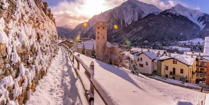Framed Print : View of snow covered mountains, rooftops and Church of Saint Pantalon in Courmayeur in winter, Courmayeur, Aosta Valley, Italian Alps, Italy Framed Print : View of snow covered mountains, rooftops and Church of Saint Pantalon in Courmayeur in winter, Courmayeur, Aosta Valley, Italian Alps, Italy