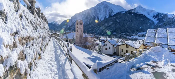 Framed Print : View of snow covered mountains, rooftops and Church of Saint Pantalon in Courmayeur in winter, Courmayeur, Aosta Valley, Italian Alps, Italy Framed Print : View of snow covered mountains, rooftops and Church of Saint Pantalon in Courmayeur in winter, Courmayeur, Aosta Valley, Italian Alps, Italy