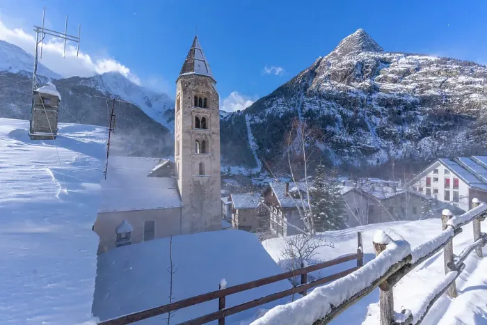 Framed Print : View of snow covered mountains, rooftops and Church of Saint Pantalon in Courmayeur in winter, Courmayeur, Aosta Valley, Italian Alps, Italy Framed Print : View of snow covered mountains, rooftops and Church of Saint Pantalon in Courmayeur in winter, Courmayeur, Aosta Valley, Italian Alps, Italy