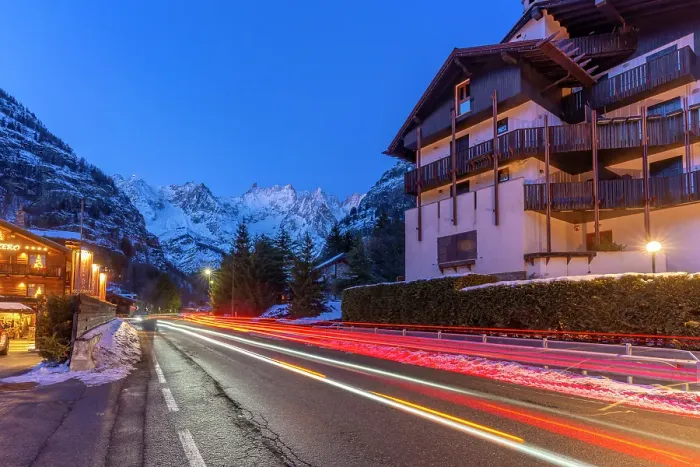Framed Print : View of snow covered mountains and trail lights in Courmayeur at dusk in winter, Courmayeur, Aosta Valley, Italian Alps, Italy Framed Print : View of snow covered mountains and trail lights in Courmayeur at dusk in winter, Courmayeur, Aosta Valley, Italian Alps, Italy