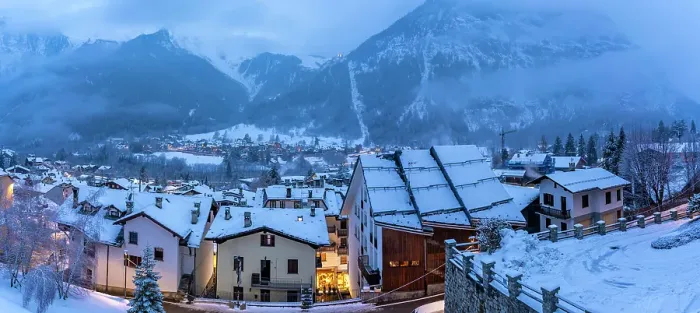 Framed Print : View of the snow covered town centre and mountainous background in winter, Courmayeur, Aosta Valley, Italy Framed Print : View of the snow covered town centre and mountainous background in winter, Courmayeur, Aosta Valley, Italy