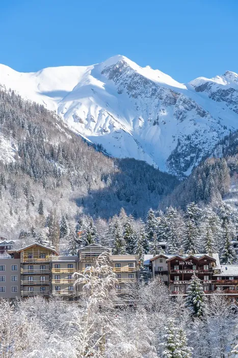 Framed Print : View of snow covered trees, mountains and Courmayeur from Dolonne in winter, Courmayeur, Aosta Valley, Italian Alps, Italy