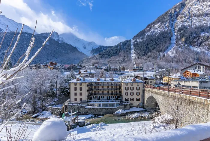 Framed Print : View of snow covered trees, mountains and Dolonne from Courmayeur in winter, Courmayeur, Aosta Valley, Italian Alps, Italy