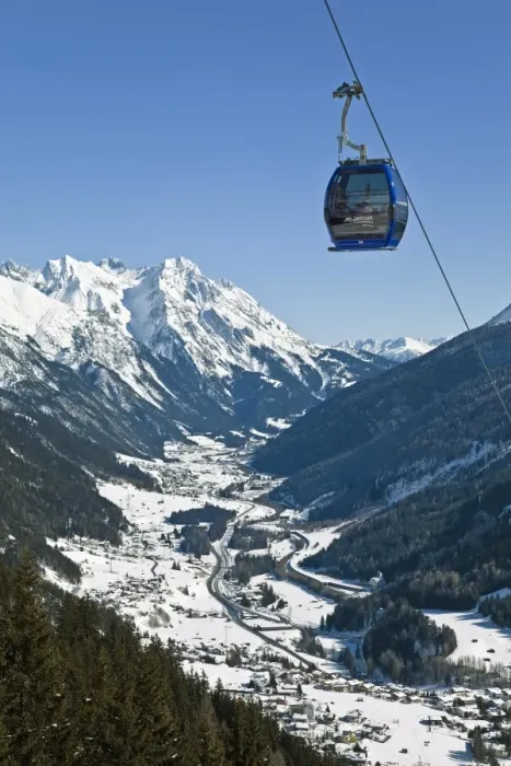 Framed Print : View over St. Jakob from the slopes of the ski resort of St. Anton, St Framed Print : View over St. Jakob from the slopes of the ski resort of St. Anton, St