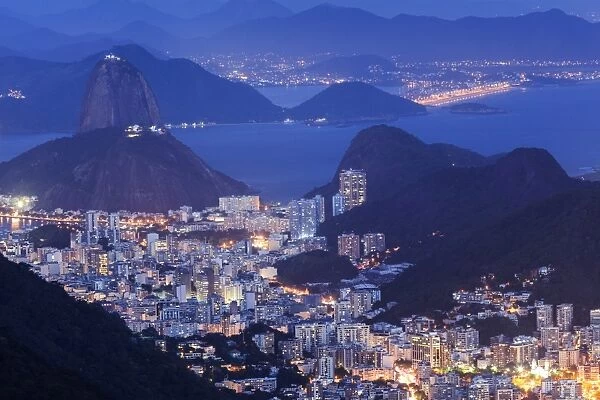 View of the Sugar Loaf and Guanabara Bay at night from Tijuca National Park, Rio de Janeiro