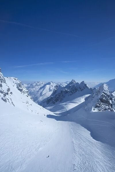 View from summit of Valluga in St. Anton am Arlberg in winter snow, Austrian Alps