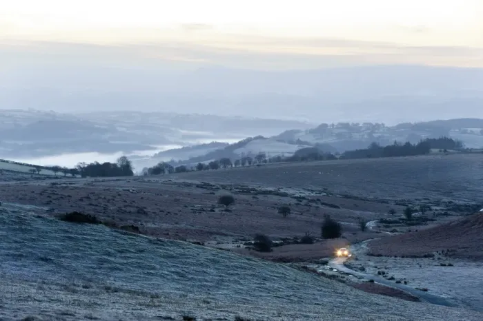 Framed Print : A view at sunrise towards The Brecon Beacons National Park, Powys, Wales, United Kingdom