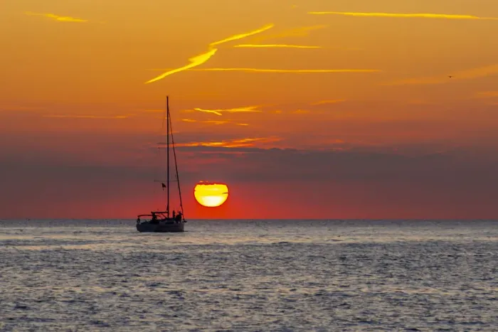 Framed Print : View of sunset and sailboat on Adriatic Sea from the old town, Rovinj, Istria, Croatia Framed Print : View of sunset and sailboat on Adriatic Sea from the old town, Rovinj, Istria, Croatia