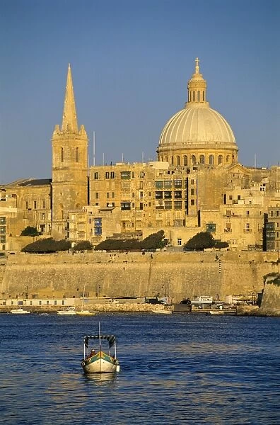 View at sunset to Valletta with Dome of Carmelite Church, Valletta, Malta