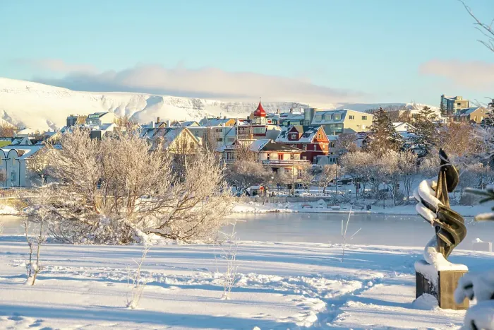 Framed Print : View of Tjornin park, town and mountains on a sunny day in winter, Reykjavik, Iceland Framed Print : View of Tjornin park, town and mountains on a sunny day in winter, Reykjavik, Iceland