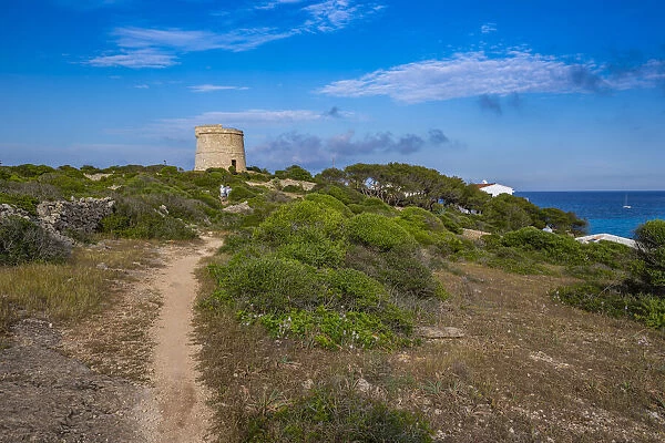 View of Torre de Son Ganxo and lighthouse on Illa de I Aire, Punta Prima, Menorca, Balearic Islands, Spain, Mediterranean, Europe