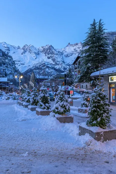 Framed Print : View of town centre and snow covered mountains in background at dusk, Courmayeur, Aosta Valley, Italian Alps, Italy Framed Print : View of town centre and snow covered mountains in background at dusk, Courmayeur, Aosta Valley, Italian Alps, Italy