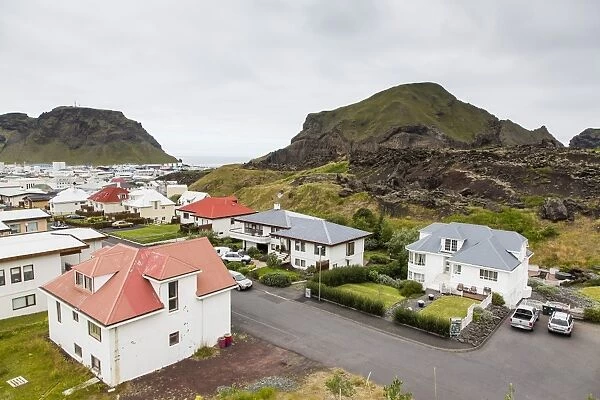 View over the town of Heimaey from recent lava flow on Heimaey Island, Iceland, Polar Regions