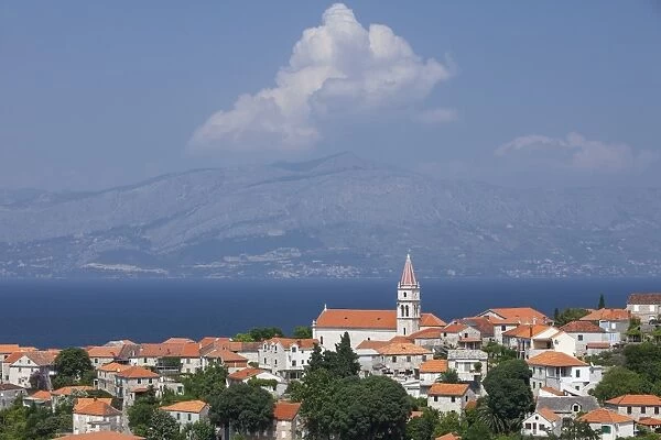 View of town with mainland in background, Postira, Brac Island, Dalmatian Coast, Croatia, Europe