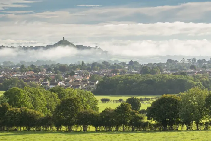 Framed Print : View across the town of Street towards Glastonbury Tor on a misty autumn morning Framed Print : View across the town of Street towards Glastonbury Tor on a misty autumn morning