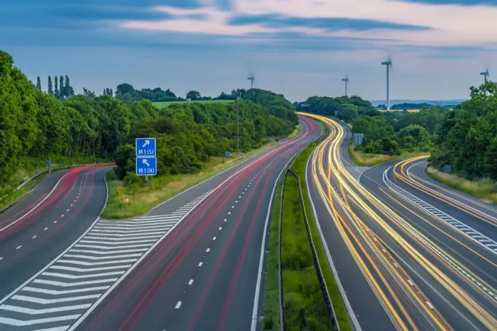 Framed Print : View of trail lights on the intersection of M1 and M18 Motorways at dusk in South Framed Print : View of trail lights on the intersection of M1 and M18 Motorways at dusk in South