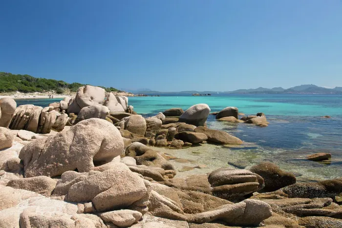 Framed Print : View across tranquil Cala Volpe, granite rocks on shore, La Celvia, Costa Smeralda, Arzachena, Sassari, Sardinia, Italy, Mediterranean, Europe
