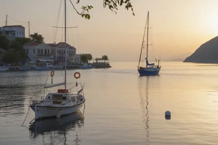 Framed Print : View across the tranquil harbour, sunrise, Gialos (Yialos), Symi (Simi), Rhodes, Dodecanese Islands Framed Print : View across the tranquil harbour, sunrise, Gialos (Yialos), Symi (Simi), Rhodes, Dodecanese Islands