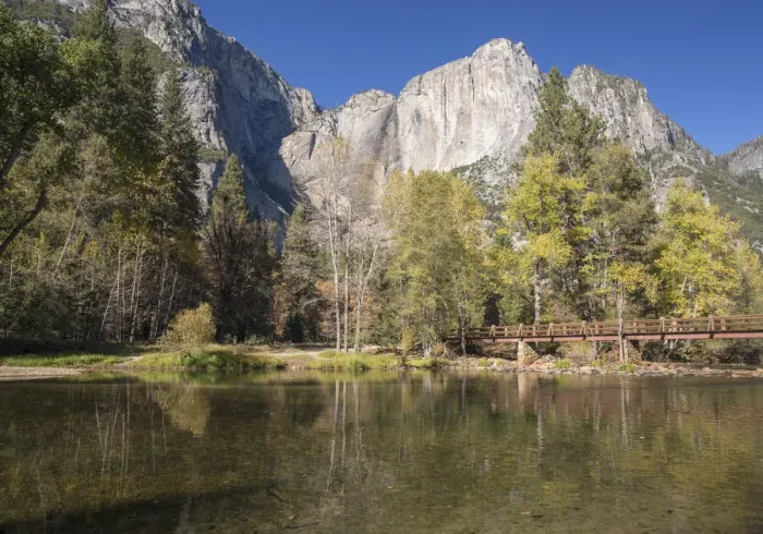 Framed Print : View across the tranquil Merced River below Swinging Bridge, autumn, Yosemite Village Framed Print : View across the tranquil Merced River below Swinging Bridge, autumn, Yosemite Village