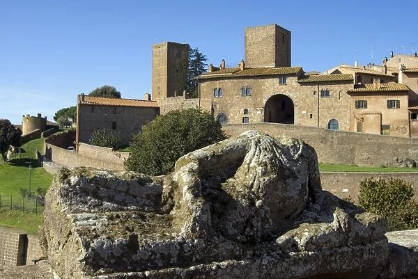 View of Tuscania from Bastianini Square and Etruscan sarcophagus