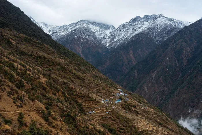 Framed Print : View along the vast valley with towering snowy mountains and Sherpagaon village on the slopes, the Langtang Valley trek, Himalayas, Nepal, Asia Framed Print : View along the vast valley with towering snowy mountains and Sherpagaon village on the slopes, the Langtang Valley trek, Himalayas, Nepal, Asia