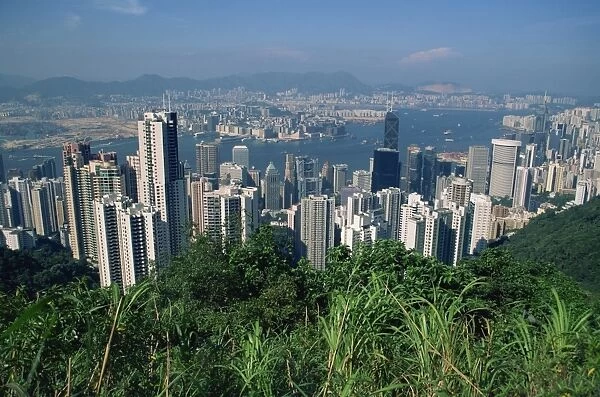 View from Victoria Peak over the city skyline of Hong Kong Island to Kowloon in the distance