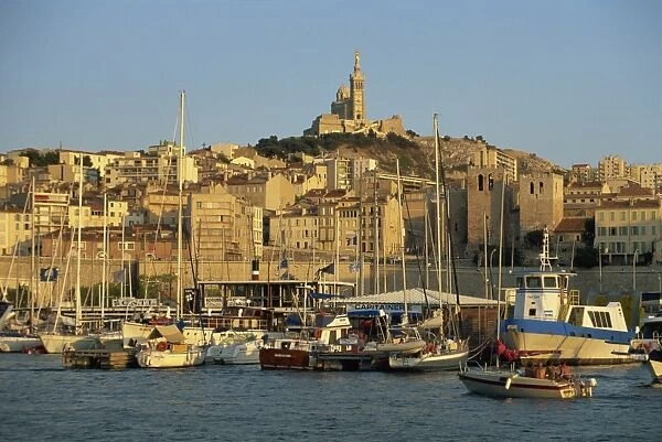 View across the Vieux Port to the basilica of Notre Dame de la Garde, Marseille