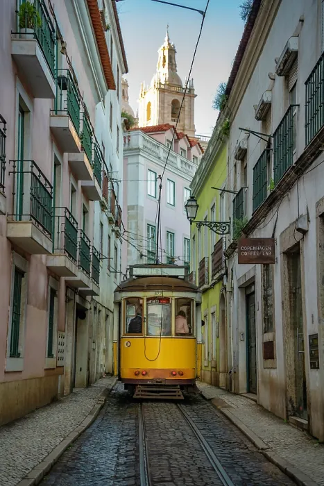 Framed Print : View of vintage tram and colourful buildings in the Alfama District on a sunny day, Lisbon, Portugal, Europe