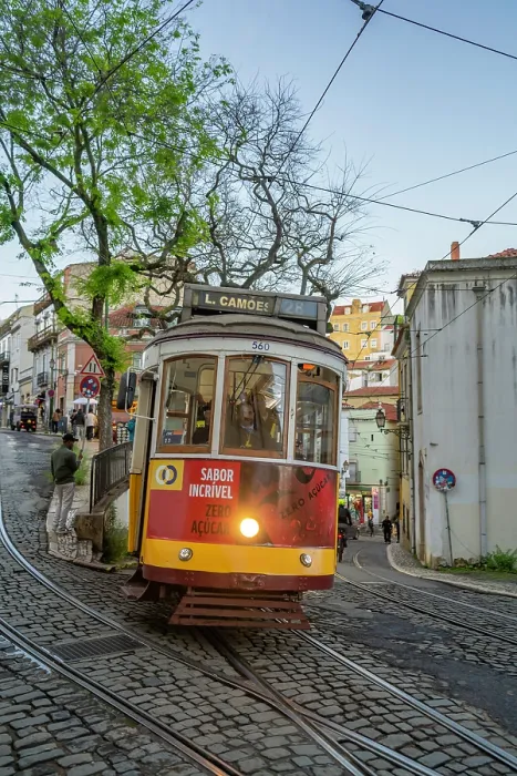 Framed Print : View of vintage tram and colourful buildings in the Alfama District on a sunny day, Lisbon, Portugal, Europe