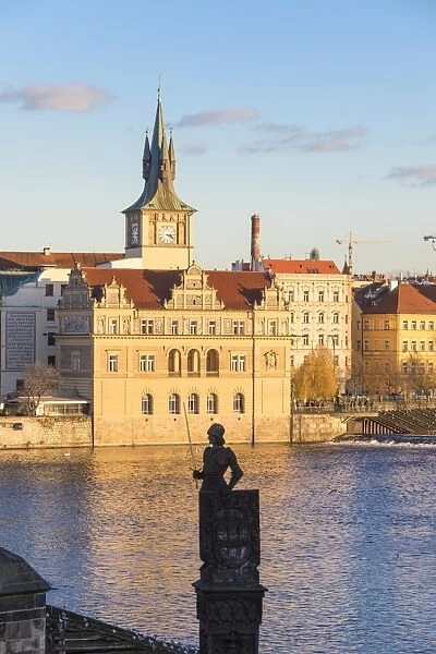 View of the Vltava River and ancient clock tower, Prague, Czech Republic, Europe