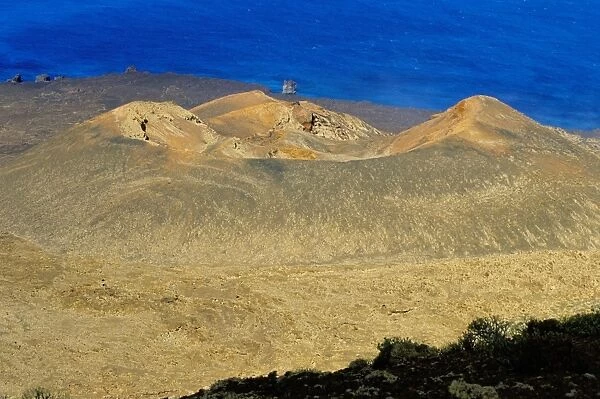 View of volcano cone taken from la Dehesa, with sea beyond, El Hierro, Canary Islands