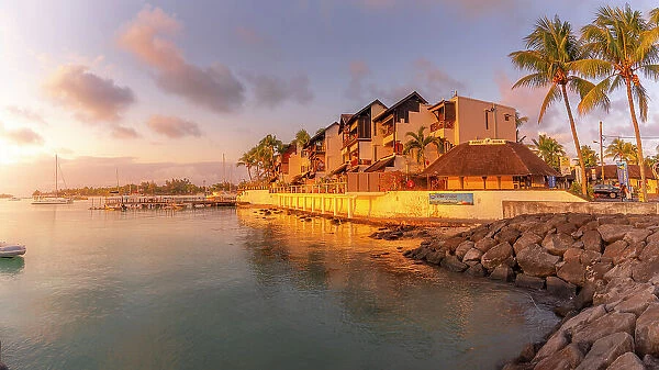 View of waterside apartments in Grand Bay at sunset, Mauritius, Indian Ocean, Africa