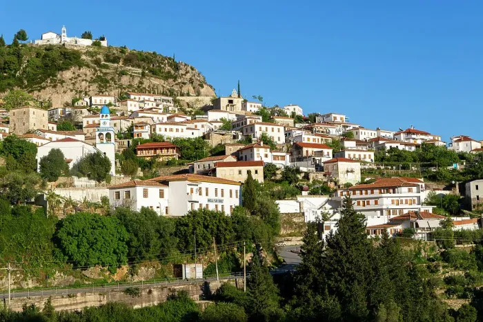 Framed Print : View of whitewashed buildings on mountainside, village of Dhermi, Albania, Europe Framed Print : View of whitewashed buildings on mountainside, village of Dhermi, Albania, Europe