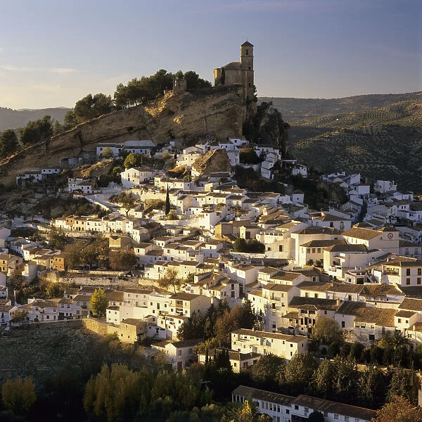 View over the whitewashed houses and old Moorish castle at sunset, Montefrio