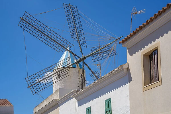 View of whitewashed houses and windmill, Sant Lluis, Menorca, Balearic Islands, Spain, Mediterranean, Europe