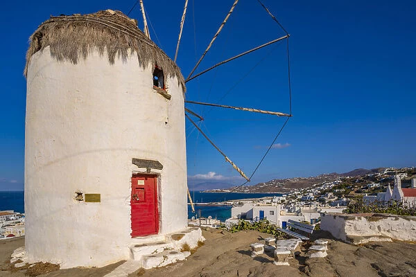 View of whitewashed windmill overlooking town, Mykonos Town, Mykonos, Cyclades Islands