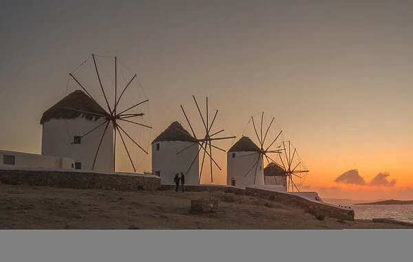 View of the windmills in Mykonos Town at sunset, Mykonos, Cyclades Islands, Greek Islands