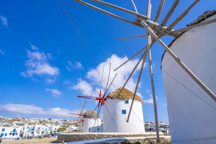 Framed Print : View of windmills and town in background, Mykonos Town, Mykonos, Cyclades Islands Framed Print : View of windmills and town in background, Mykonos Town, Mykonos, Cyclades Islands