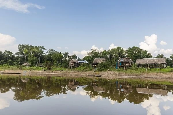 Village on the banks of the El Dorado, Upper Amazon River Basin, Loreto, Peru, South
