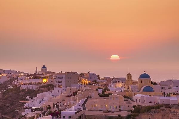 The village of Oia in the evening at sunset, Santorini (Thira) Cyclades Islands, Greek Islands, Greece, Europe