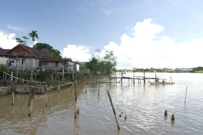 Framed Print : Village of stilted houses on the banks of the Rejang River, Sarakei district Framed Print : Village of stilted houses on the banks of the Rejang River, Sarakei district